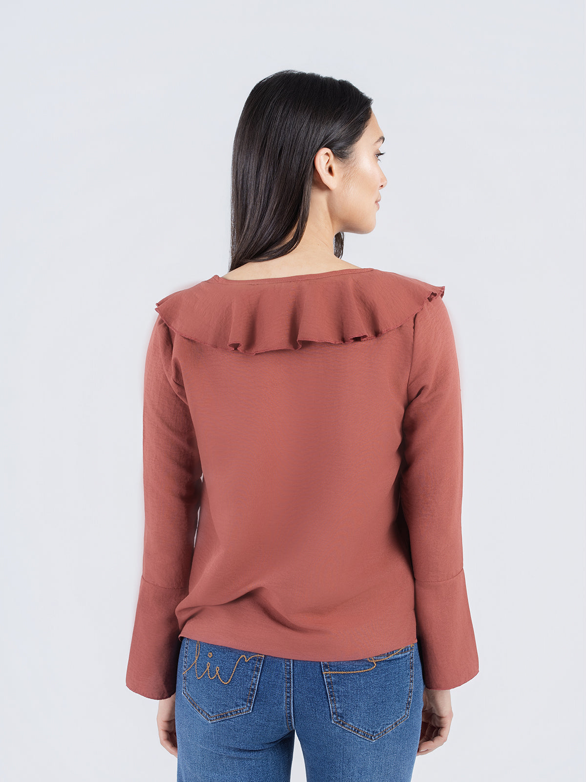 Blouse à col à volants