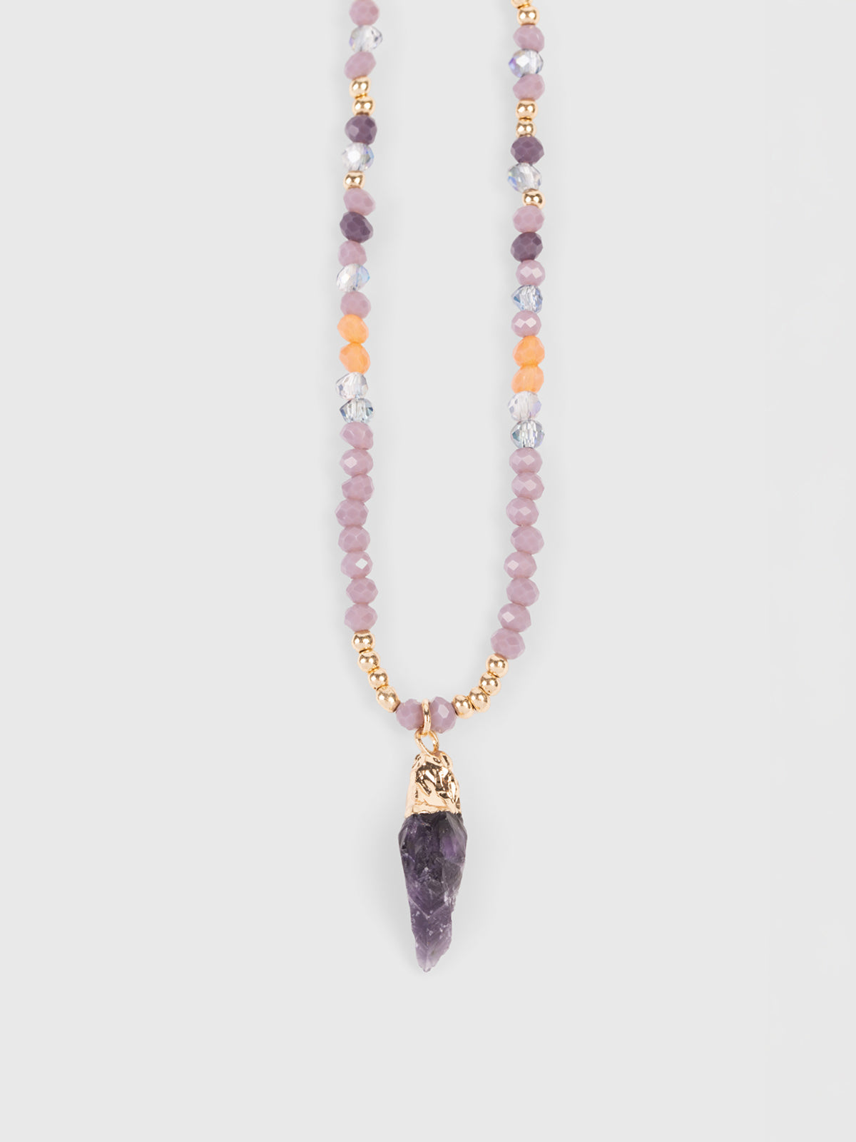 Collier long en pierres violettes