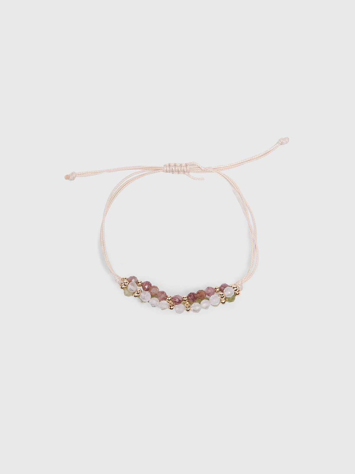 Bracelet cordon orné de pierres