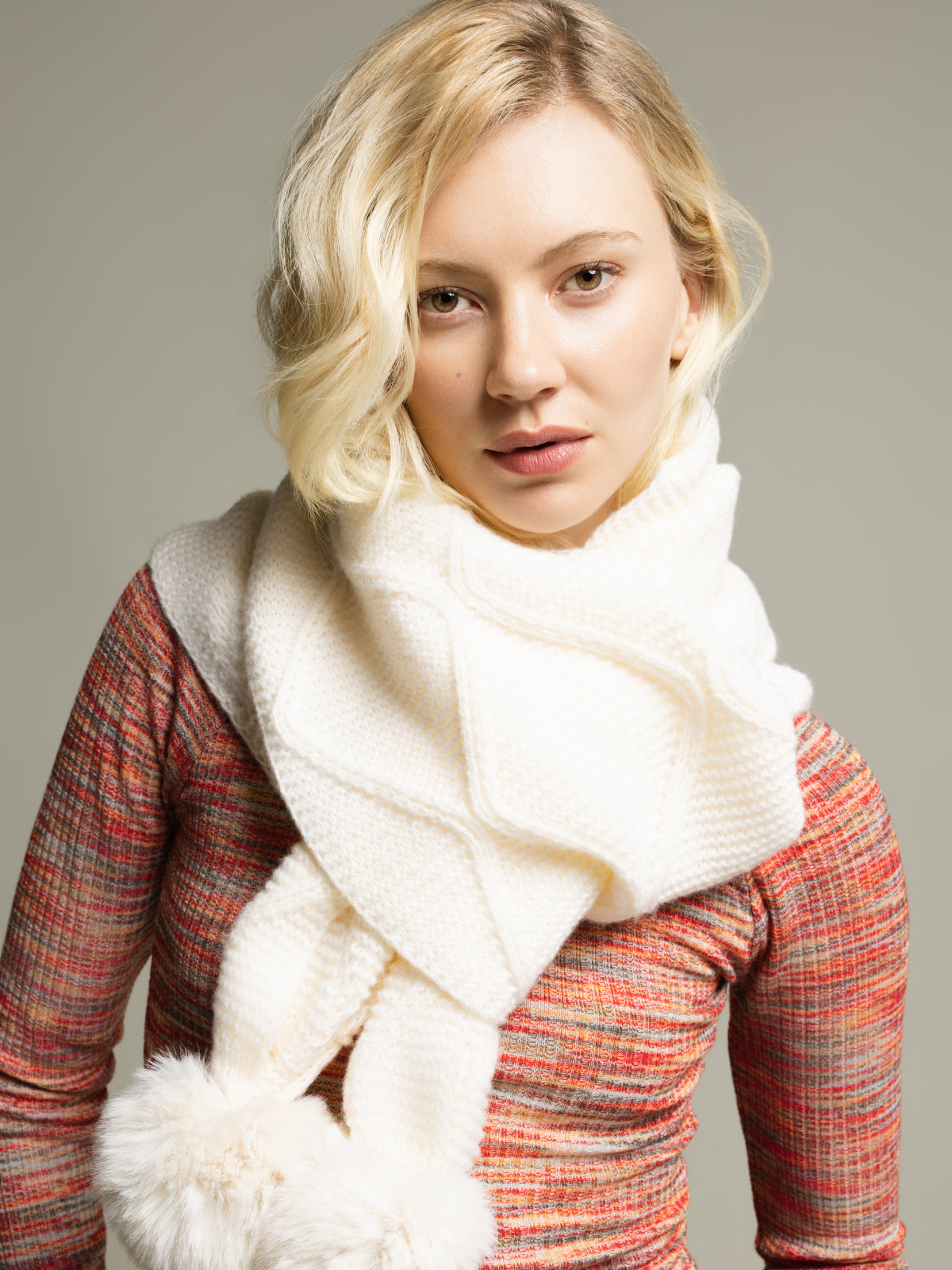 Winter scarf with pompoms