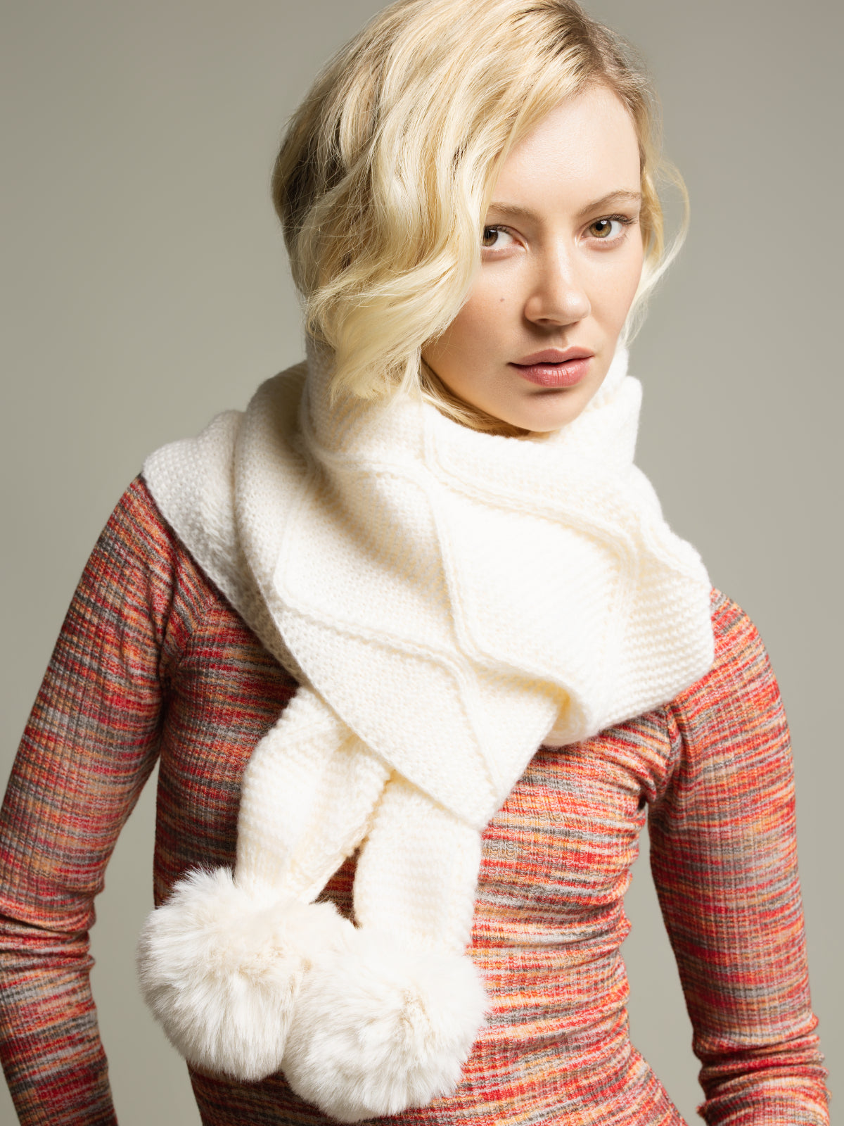 Winter scarf with pompoms