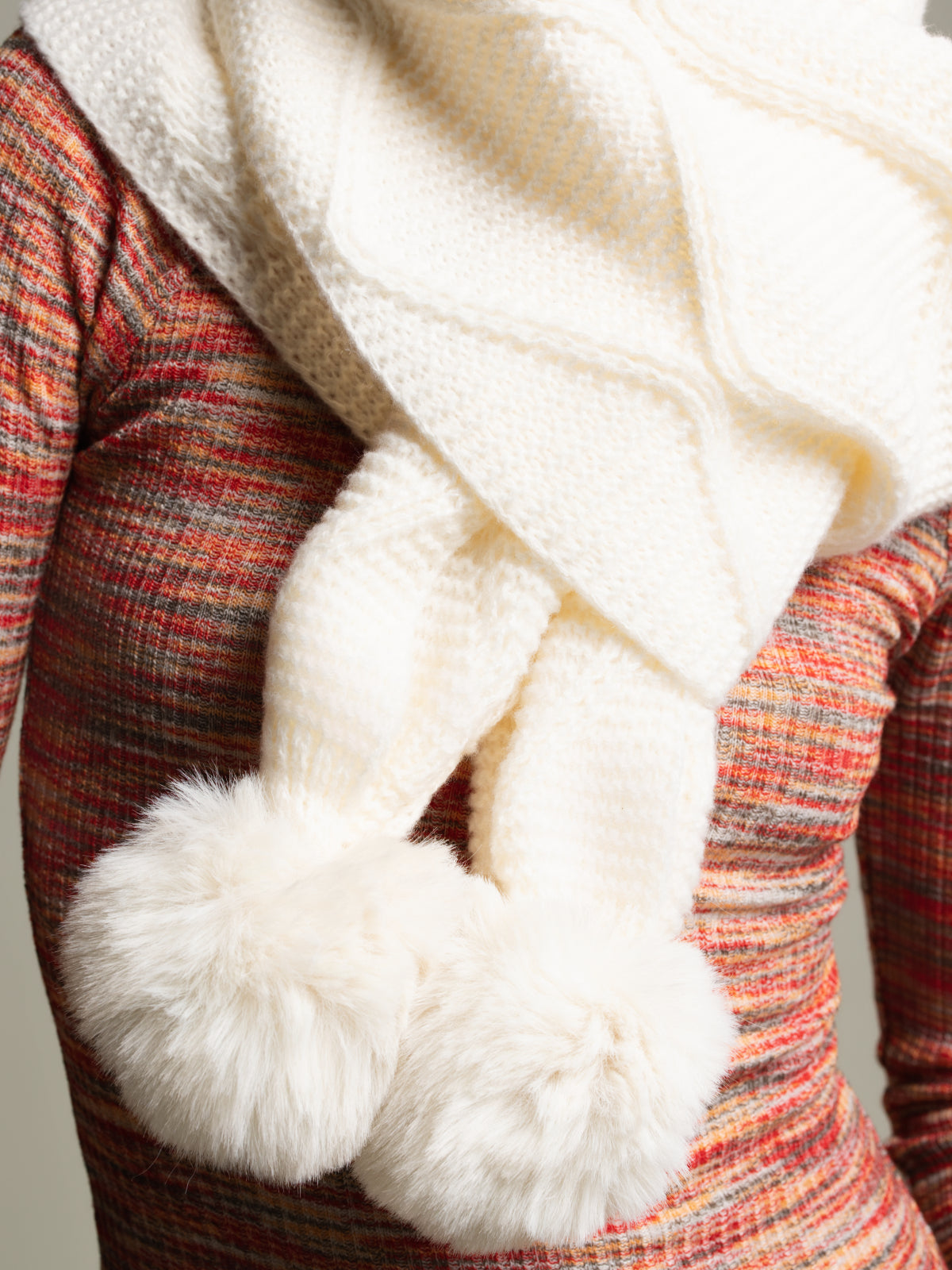 Winter scarf with pompoms